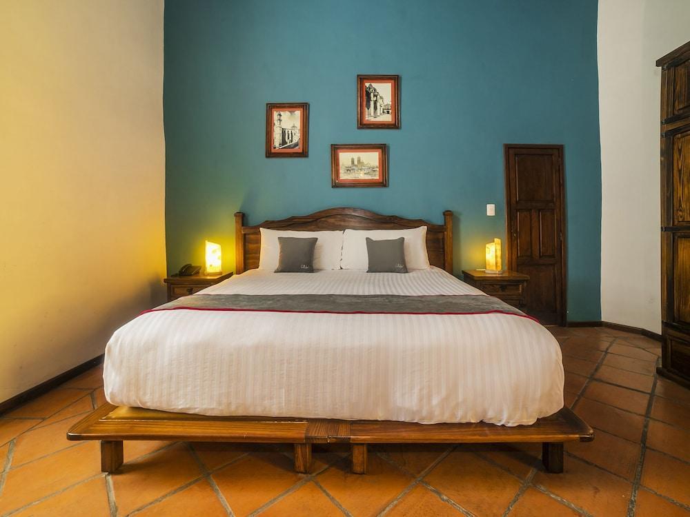 فندق Collection O Al Otro Lado Del Rio, بويبلا المظهر الخارجي الصورة A bedroom at the hotel