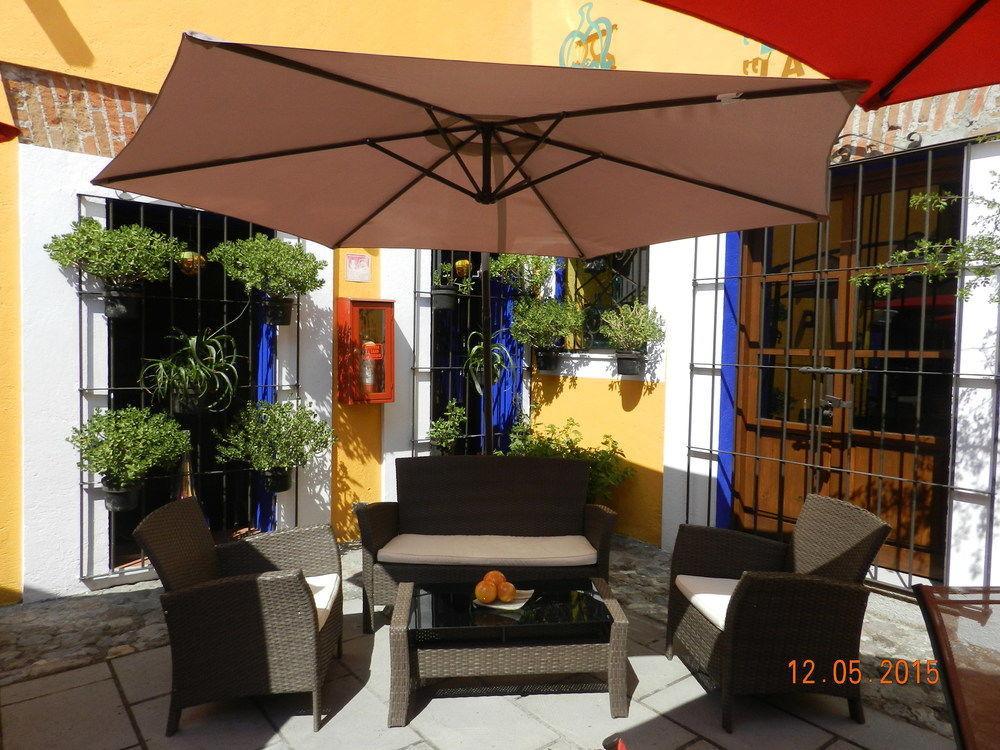 فندق Collection O Al Otro Lado Del Rio, بويبلا المظهر الخارجي الصورة A patio in Mexico City