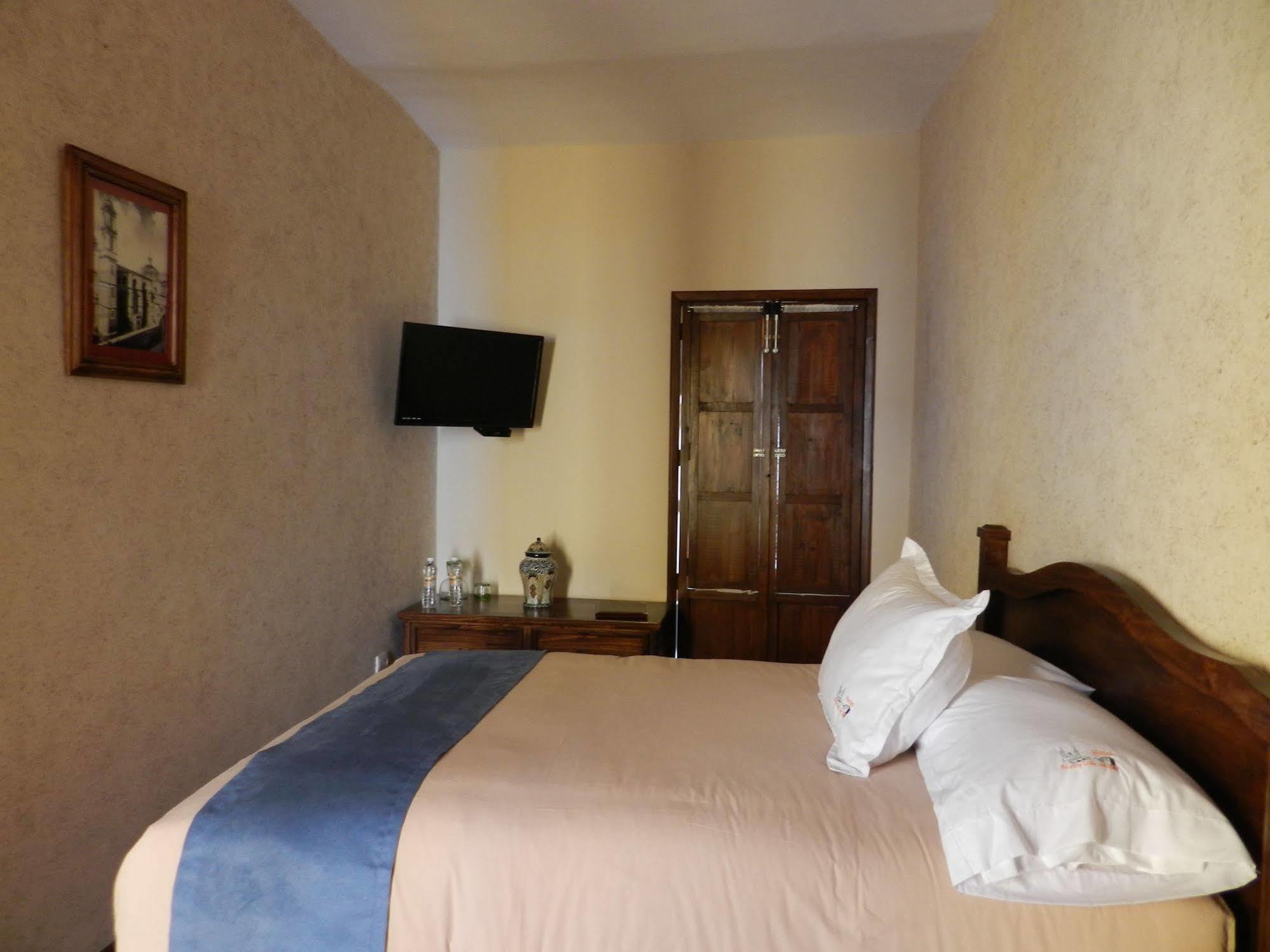 فندق Collection O Al Otro Lado Del Rio, بويبلا المظهر الخارجي الصورة A room at the hotel