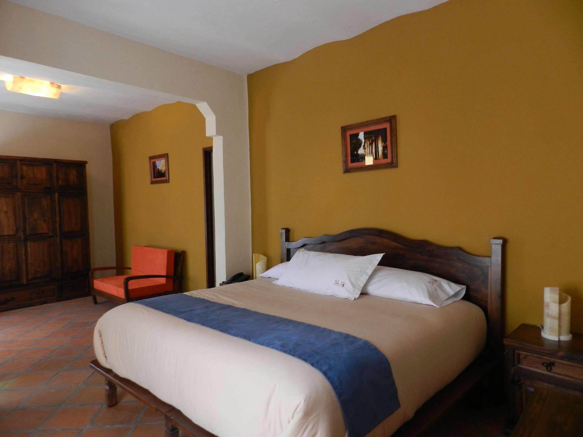 فندق Collection O Al Otro Lado Del Rio, بويبلا المظهر الخارجي الصورة A bedroom at the hotel