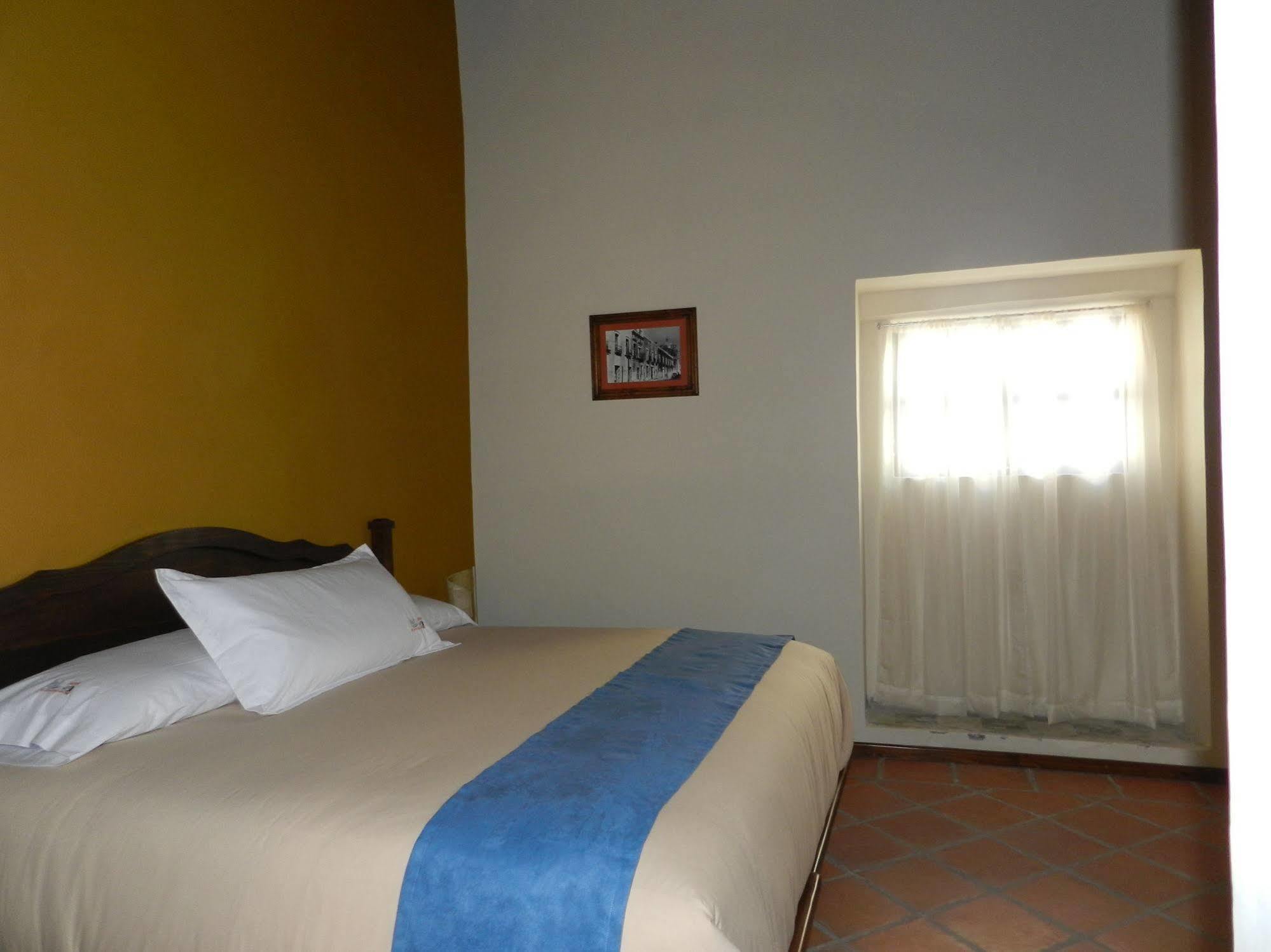فندق Collection O Al Otro Lado Del Rio, بويبلا المظهر الخارجي الصورة A room at the hotel
