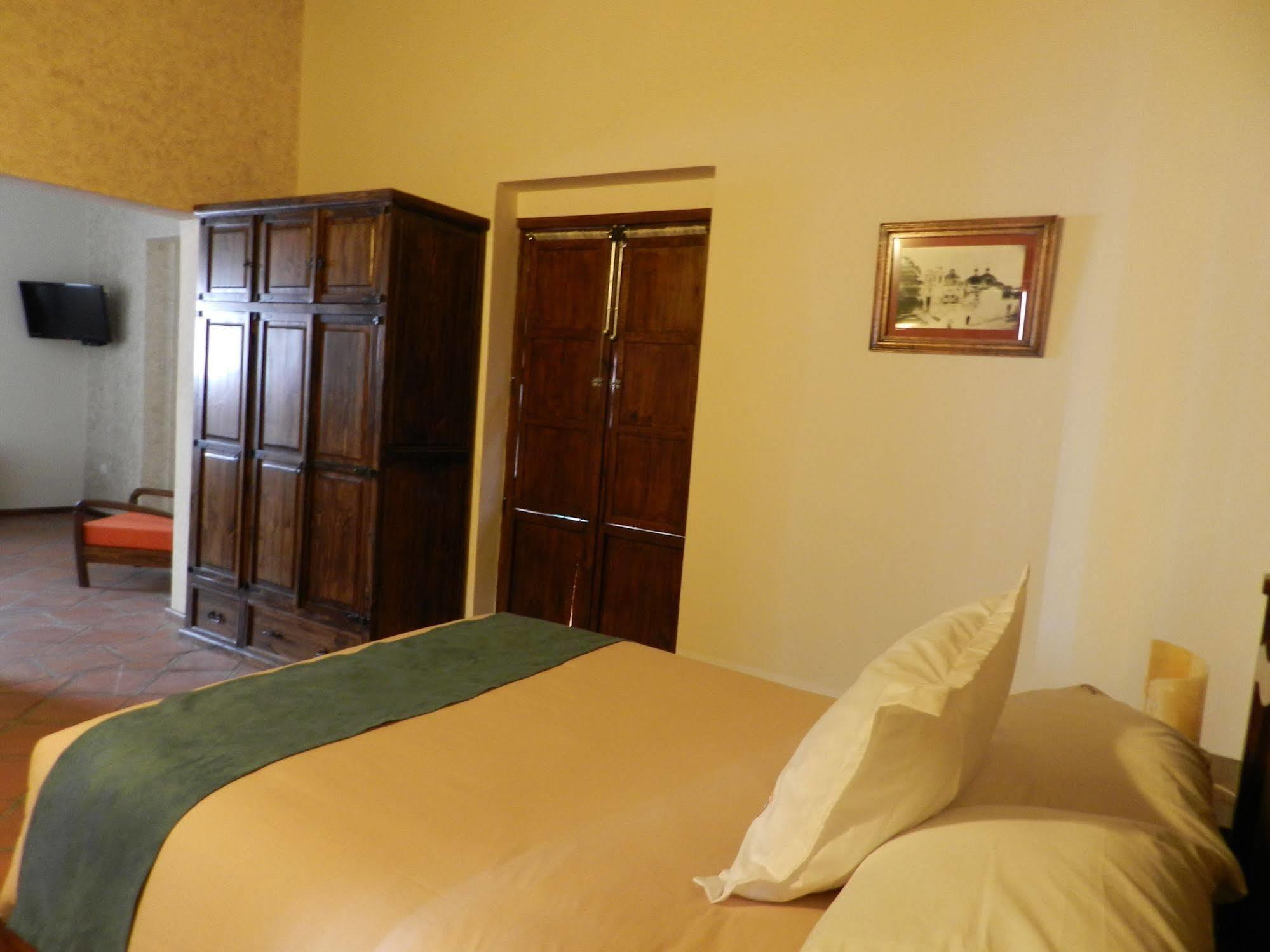 فندق Collection O Al Otro Lado Del Rio, بويبلا المظهر الخارجي الصورة A room at the hotel