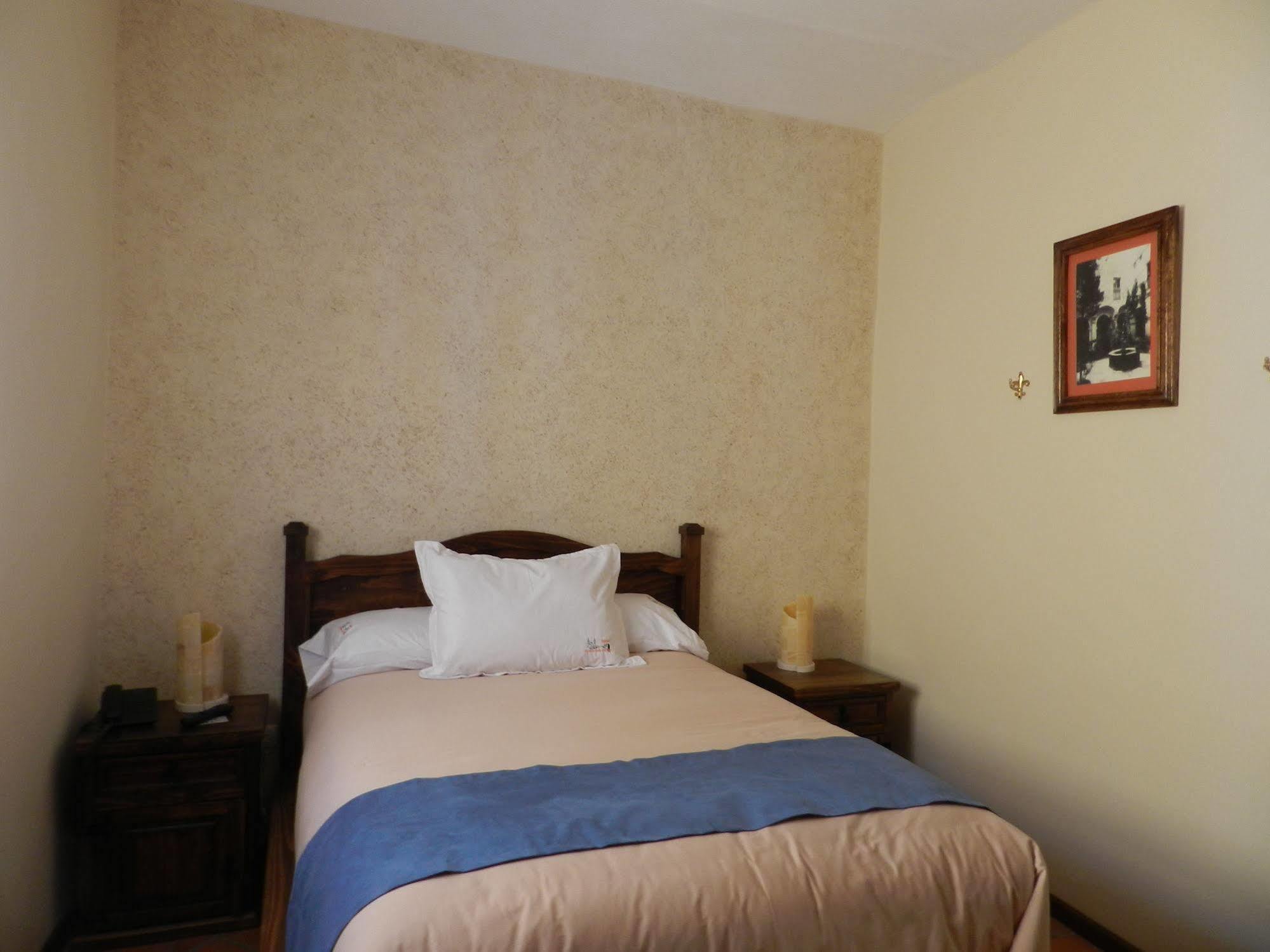 فندق Collection O Al Otro Lado Del Rio, بويبلا المظهر الخارجي الصورة A bedroom at the hotel