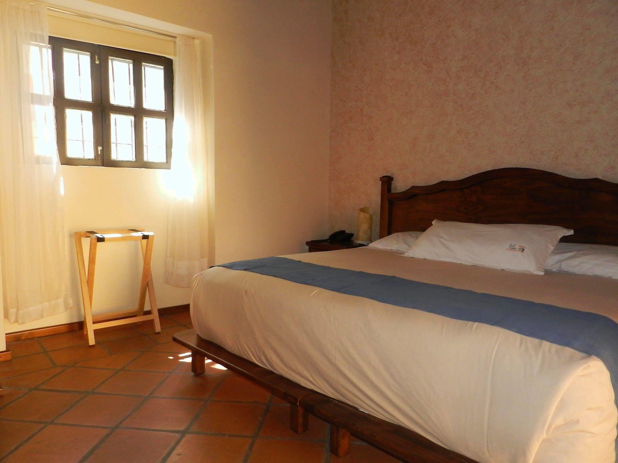 فندق Collection O Al Otro Lado Del Rio, بويبلا المظهر الخارجي الصورة A room at Hotel San Cristóbal